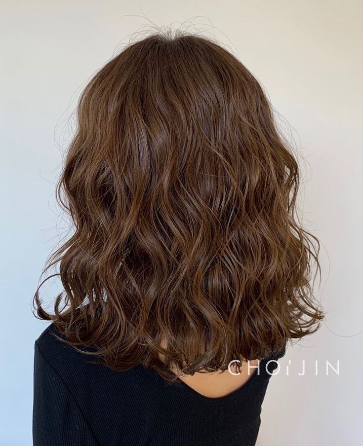 A client with a classic cold perm hairstyle