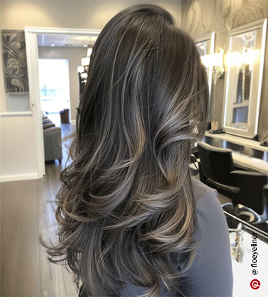 A stylist creating highlights with foils